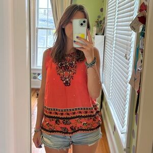 Sweet Wanderer. Size small. Dark peach with funky designs!